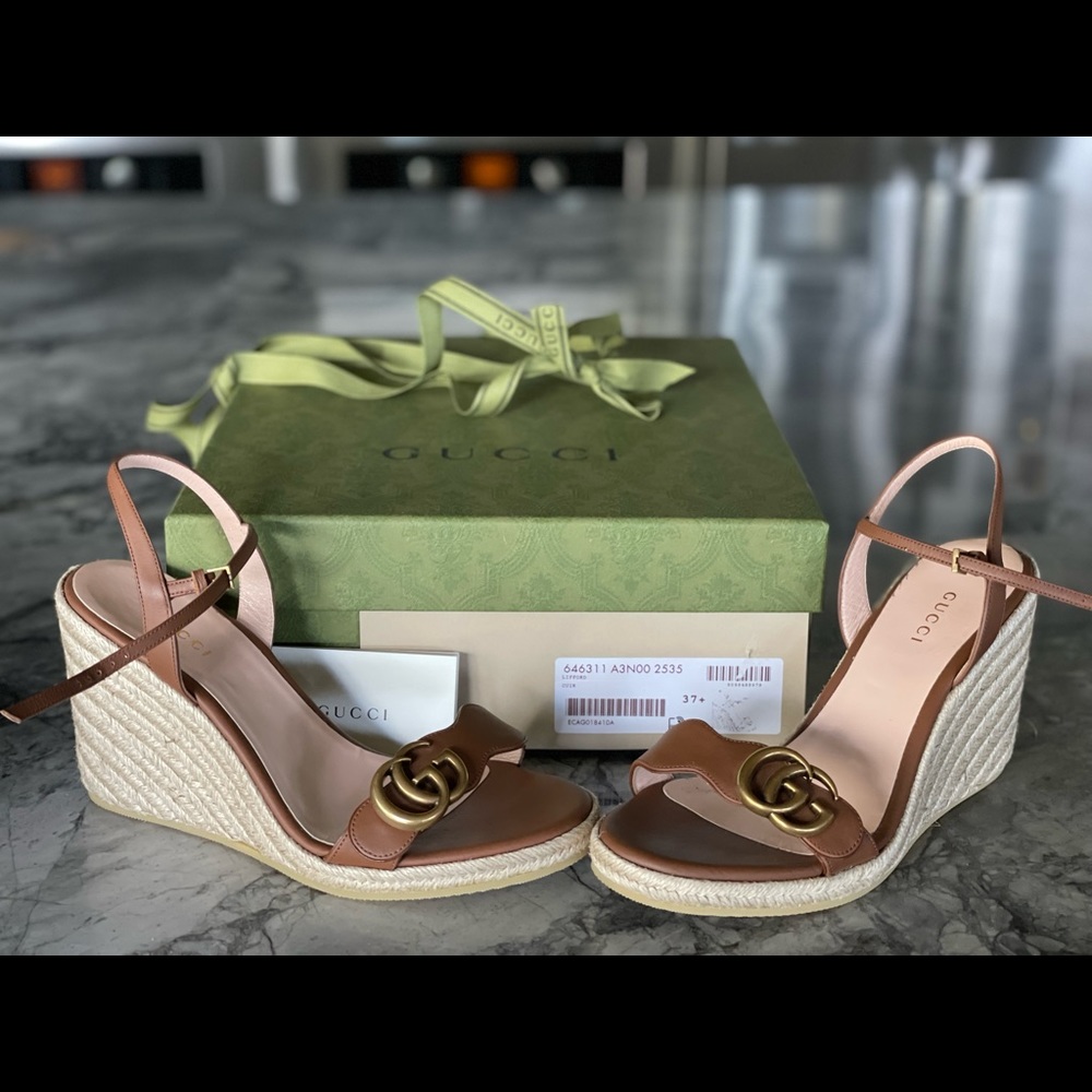 Gucci 4 inch wedge sandals from last season.
